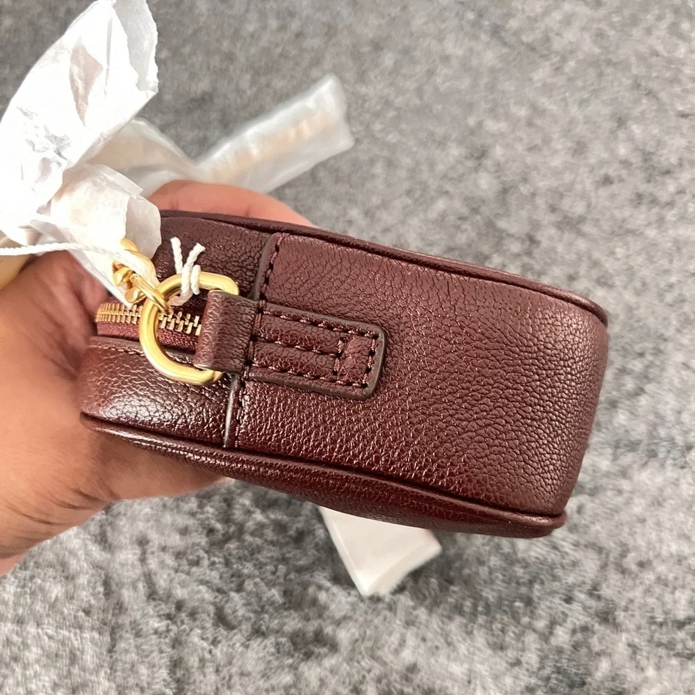 TORY BURCH • TEXTURED MCGRAW LEATHER CAMERA BAG- color WINE